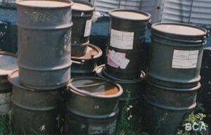 Military barrels used for storing parts and equipment