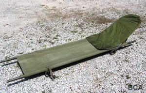 Military stretcher with head rest