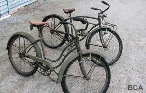 Vintage military bicycles painted US Army olive green.