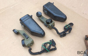 Military handheld field telephone with black plastic case